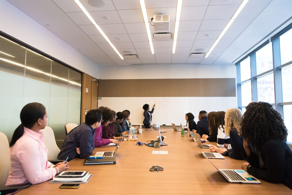 Board members meeting around a conference table